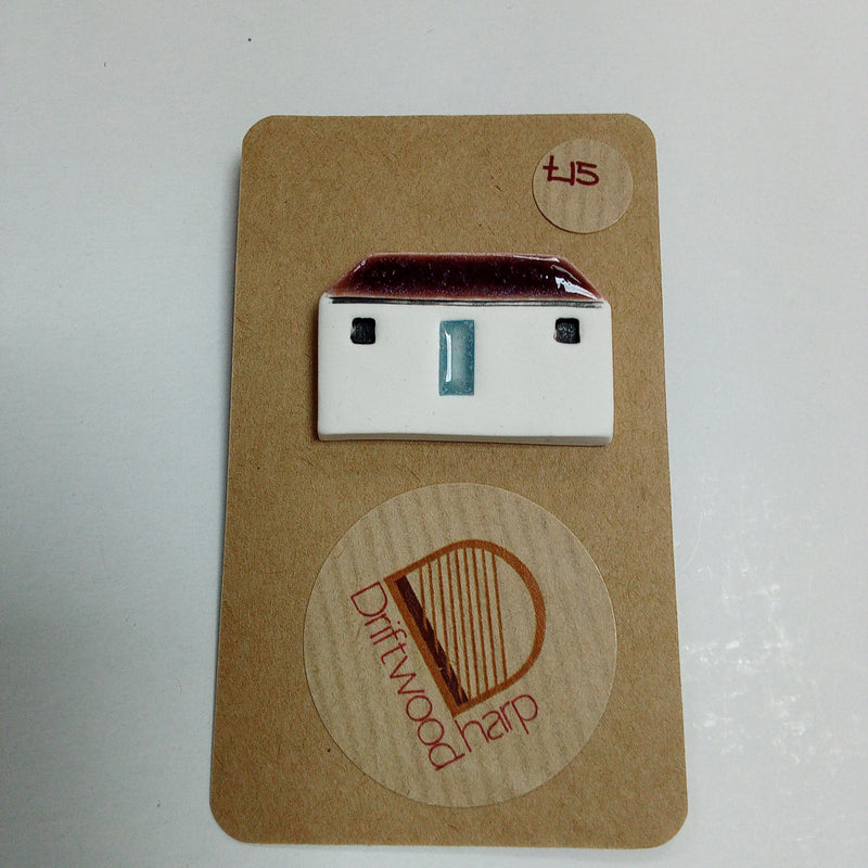 Scottish bothy ceramic brooch - burgundy roof with pale blue door
