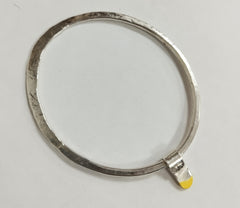 Sterling silver asymmetric bangle with yellow rubber dipped runner