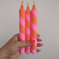Orange & neon pink stripe dinner candles