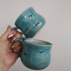 Hand thrown turquoise sky glaze rounded mug
