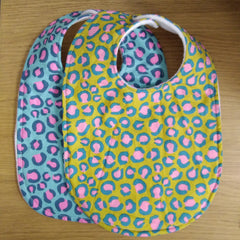 Traditional style bib - pink & green leopard print