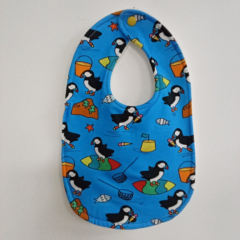 Traditional style bib - puffins at the seaside print