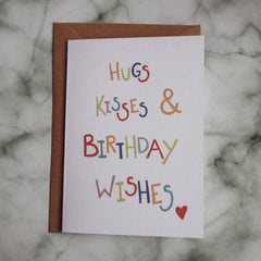 Hugs kisses and birthday wishes card