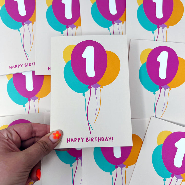 Age 1 happy birthday balloons card