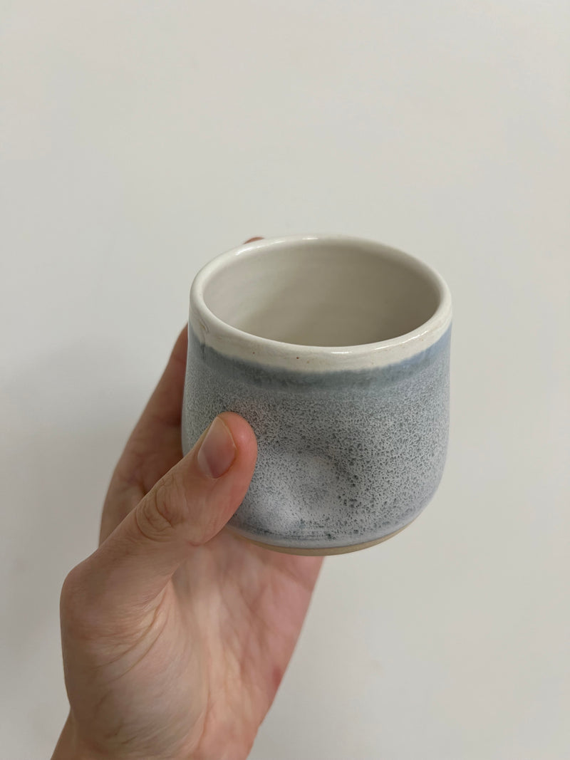 Small dimple tumbler - light blue/grey speckled glaze