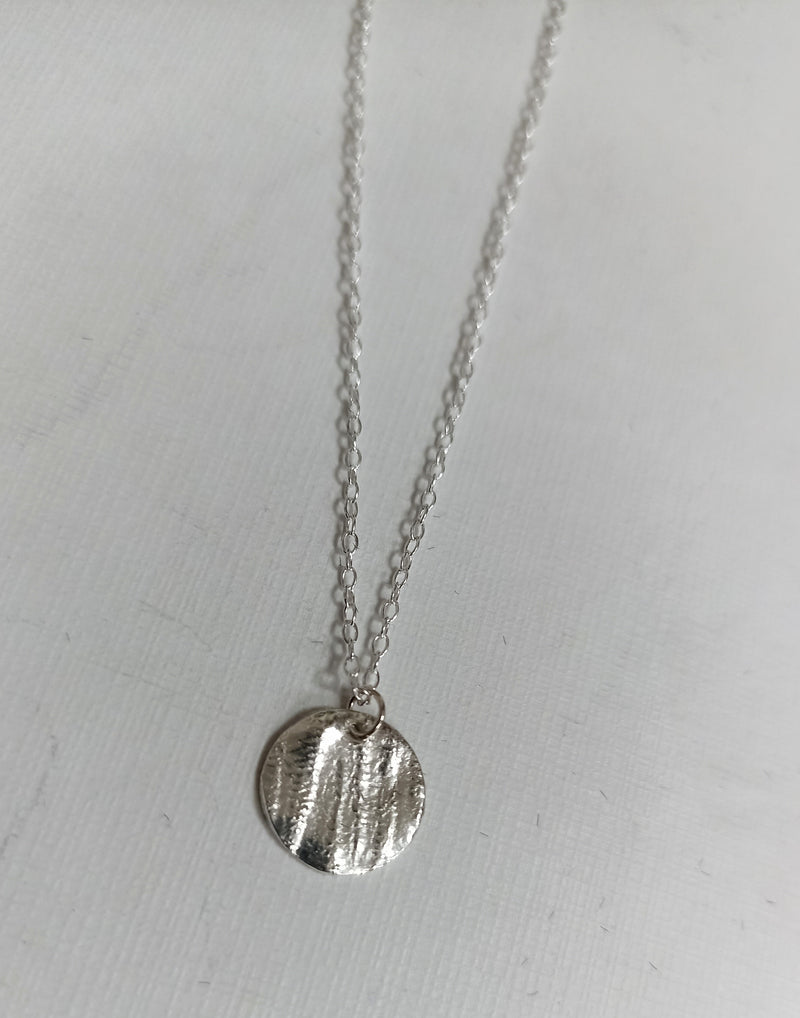 Fine silver bark textured mini disc necklace