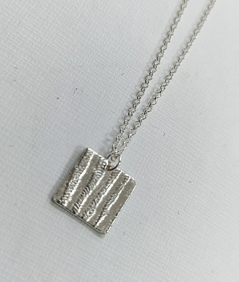 Fine silver bark textured mini square necklace