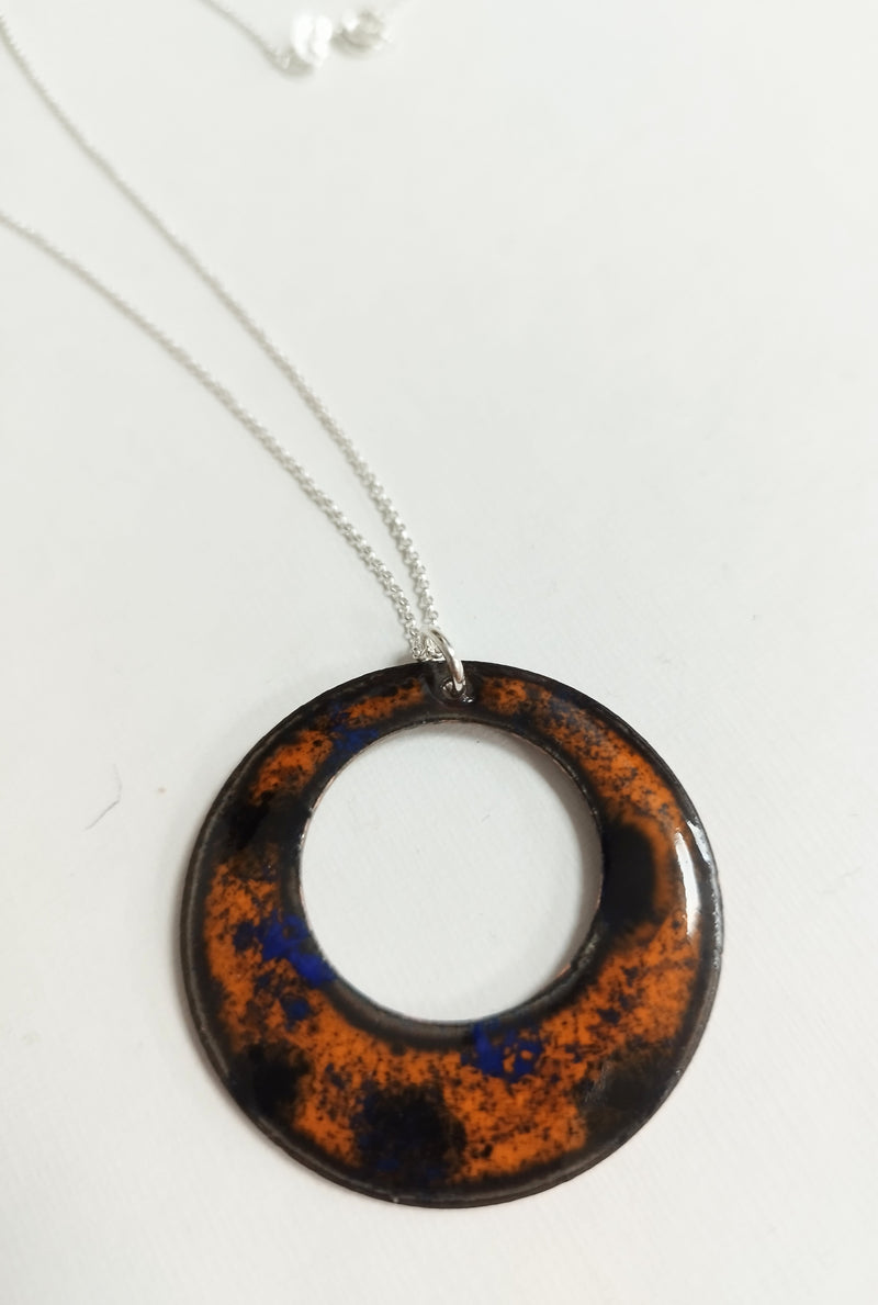 'Black hole' enamelled orange, black & blue ring necklace