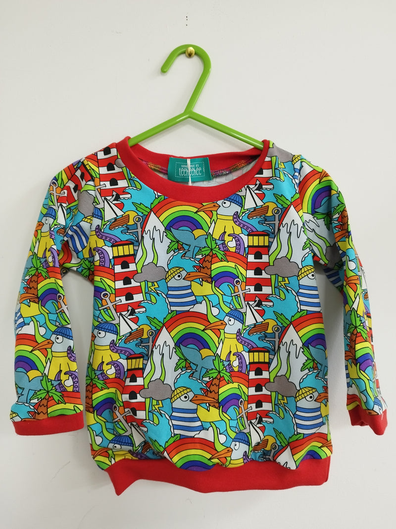 Long sleeved child t-shirt - bright seagulls in hats, lighthouses & rainbows print (12-18 months)