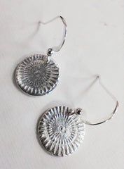 Silver sun disc drop earrings