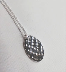 Silver textured oval necklace