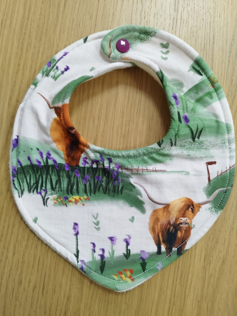 Dribble style bib - highland cow in field with purple flowers print