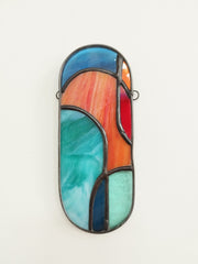 Colourful 'lozenge' hanging stained glass art