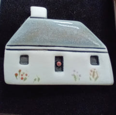 Scottish bothy ceramic brooch - pale blue roof & flowers