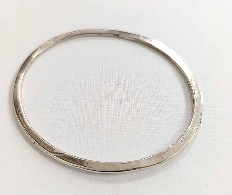 Sterling silver hammered oval bangle