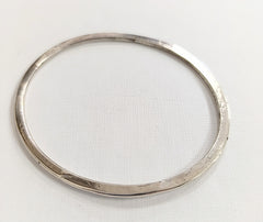 Sterling silver hammered oval bangle