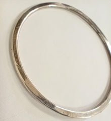 Sterling silver hammered oval bangle