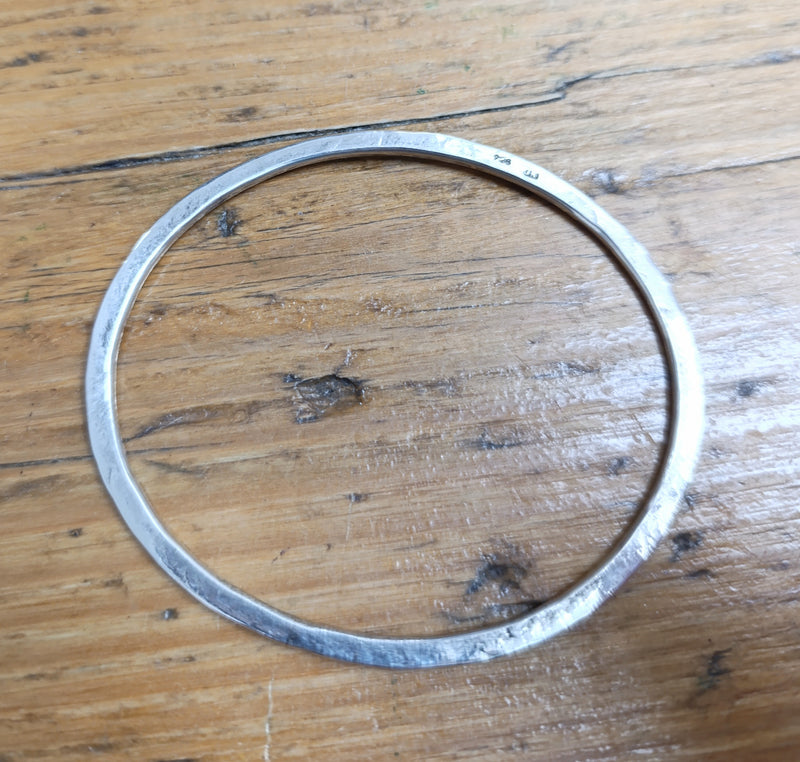 Sterling silver hammered oval bangle