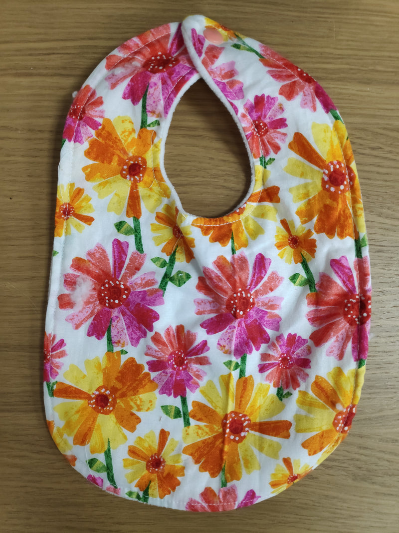 Traditional style bib - yellow and pink flowers print