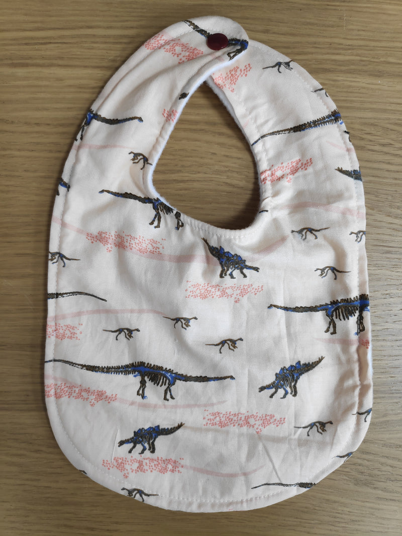 Traditional style bib - dinosaurs print