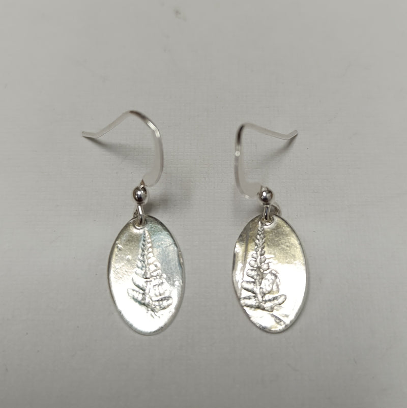 Fine silver fern imprinted oval earrings