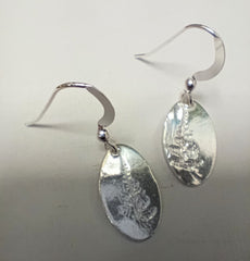 Fine silver fern imprinted oval earrings