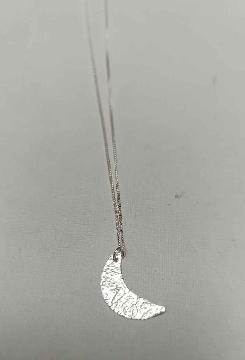 Sterling silver mini crescent moon pendant