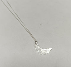 Sterling silver mini crescent moon pendant