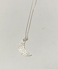 Sterling silver mini crescent moon pendant