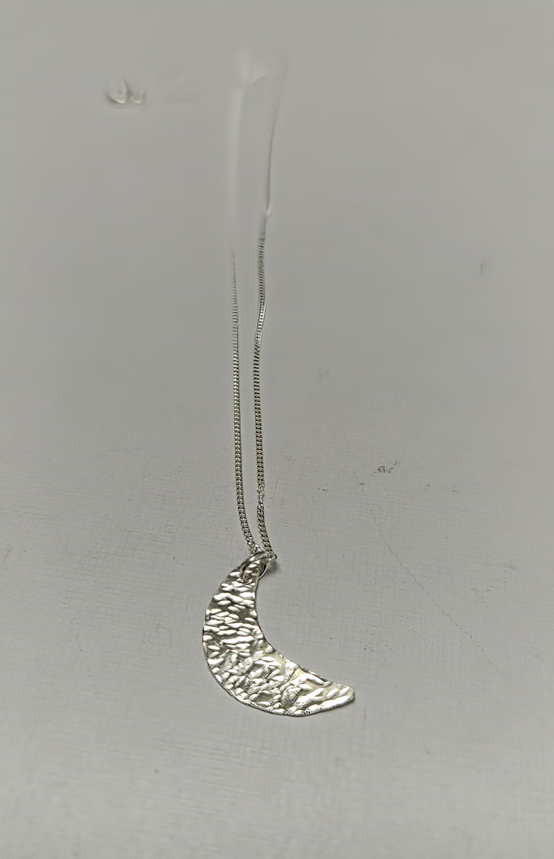 Sterling silver mini crescent moon pendant