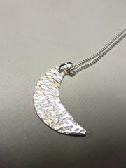 Sterling silver mini crescent moon pendant