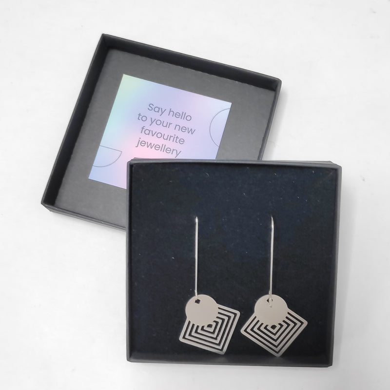 Circle on squares drop earrings