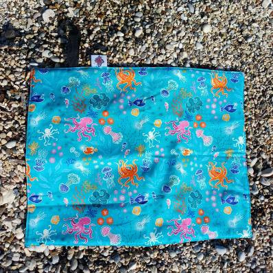 Waterproof sit mat - Ocean Glow print