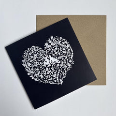 Illustrated navy blue love heart couple card