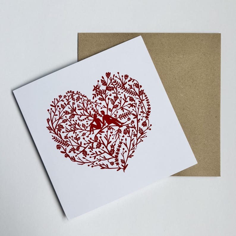 Illustrated red love heart couple card