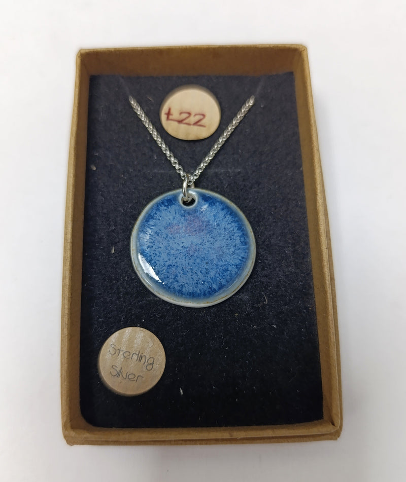 Ceramic blue circle pendant necklace