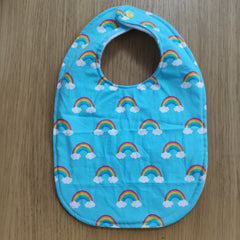 Traditional style bib - rainbows & clouds print