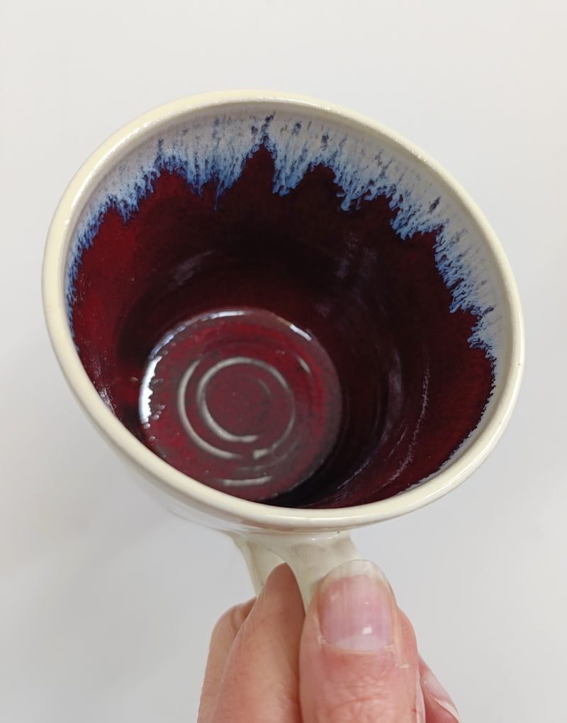 Hand thrown cream with inside terracotta glaze mug