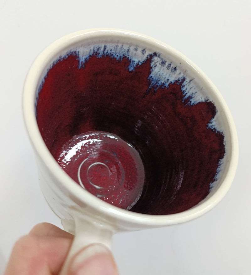 Hand thrown cream with inside terracotta glaze mug