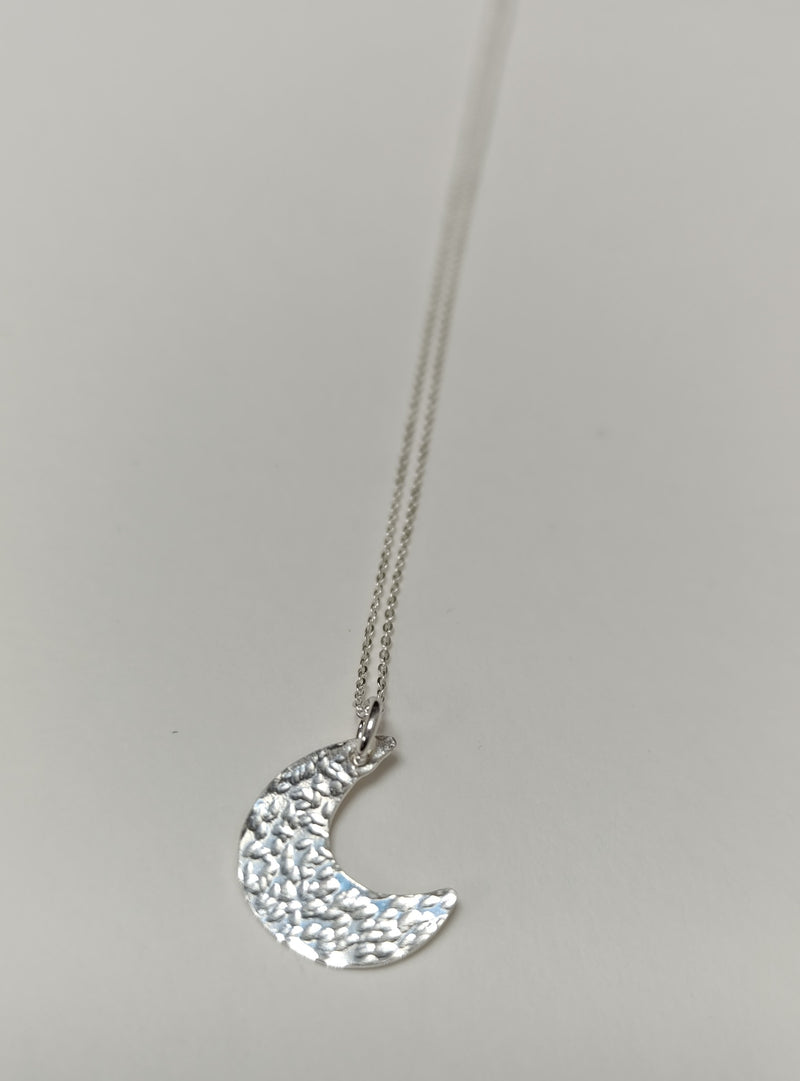 Sterling silver mini crescent moon pendant