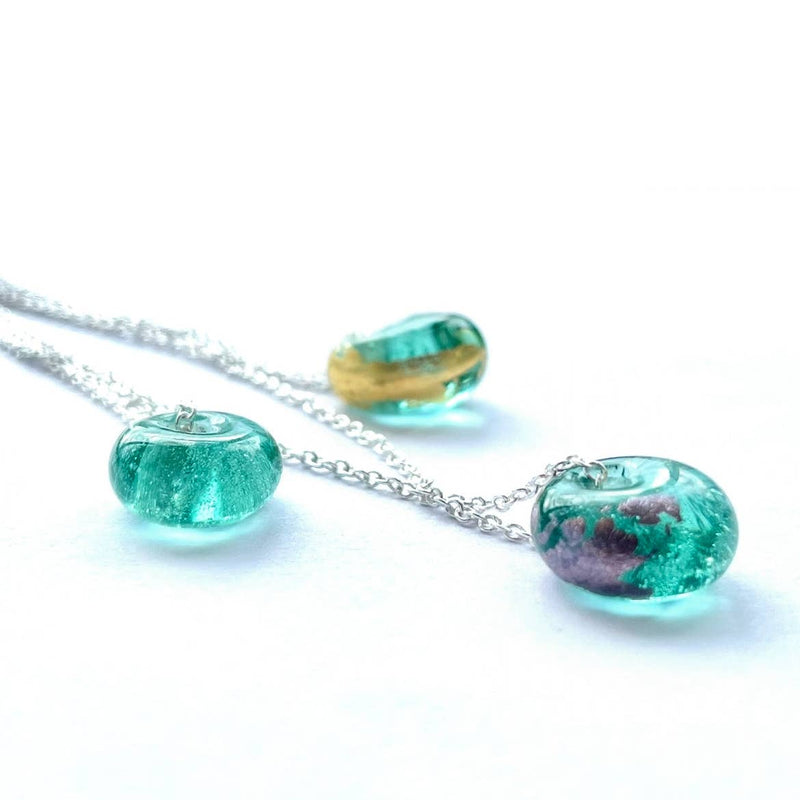 Aqua green & palladium glass whisky bottle pendant