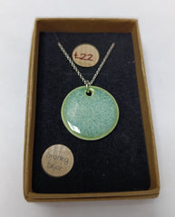 Ceramic pale green circle pendant necklace