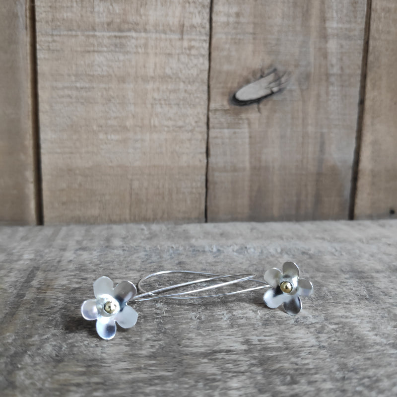 Sterling silver and 24 carat gold flower drop earrings