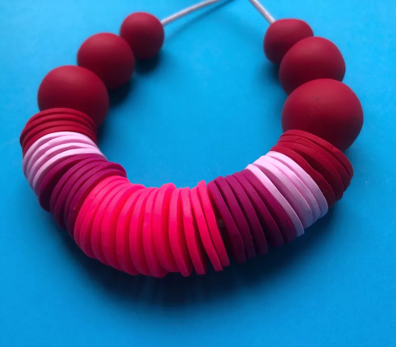 Statement bead necklace - pinks & reds