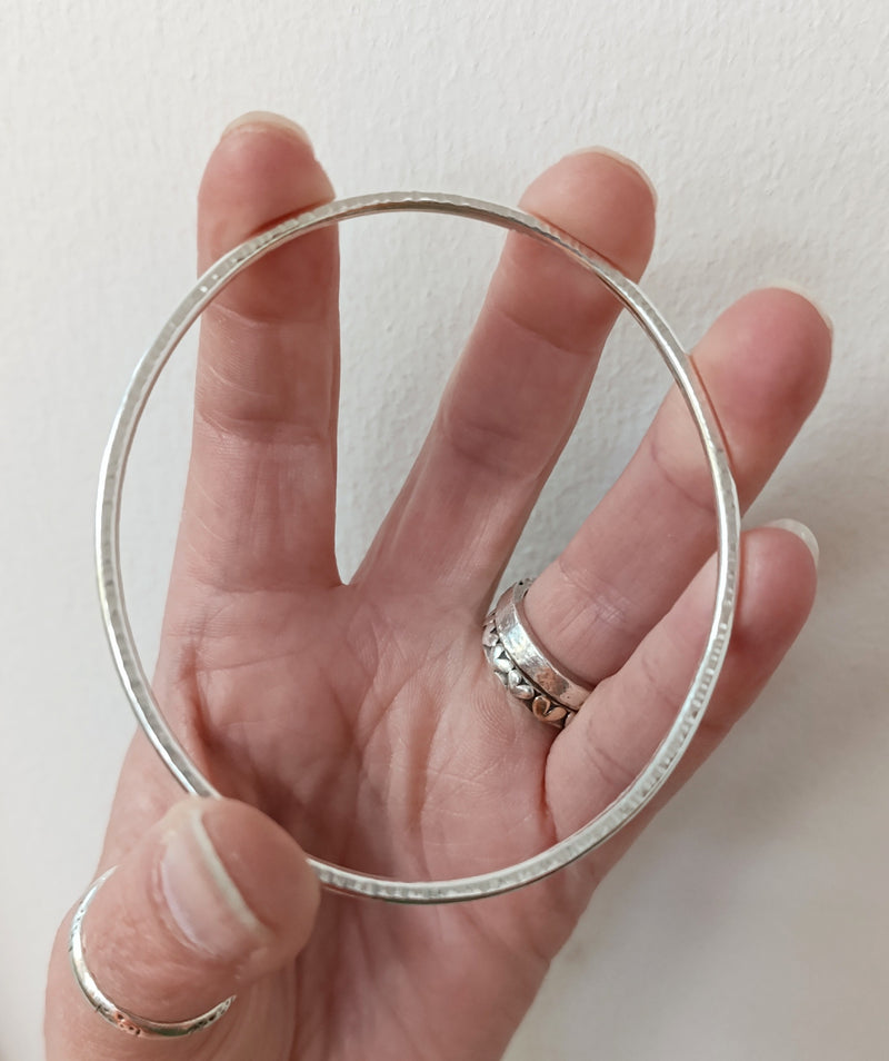 Sterling silver hammered oval bangle