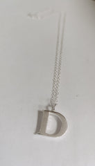 Sterling silver sand cast letter D necklace