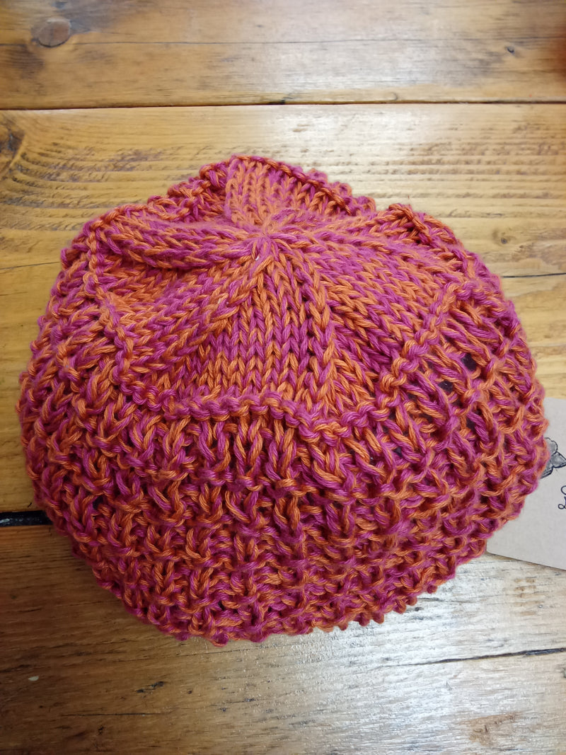 Hand knitted lightweight cotton adult hat in Brick design - pink and orange