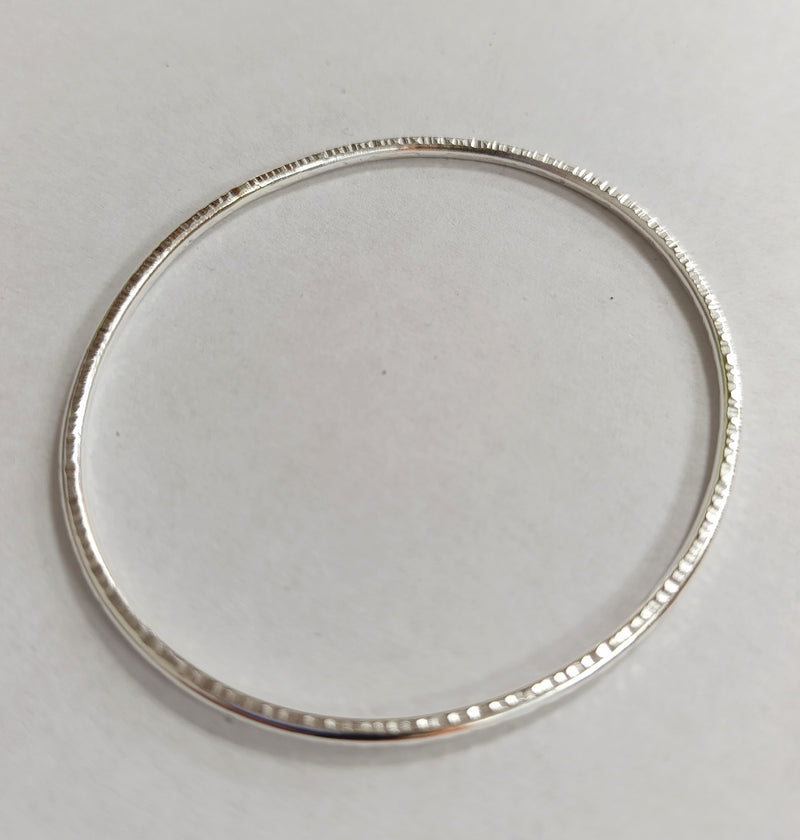 Sterling silver hammered oval bangle
