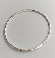 Sterling silver hammered oval bangle