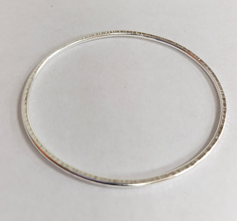 Sterling silver hammered oval bangle